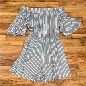 BRAND NEW, never worn off the should romper